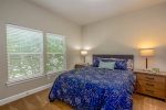 Second queen bedroom that has plenty of space to relax, read a book, or nap 